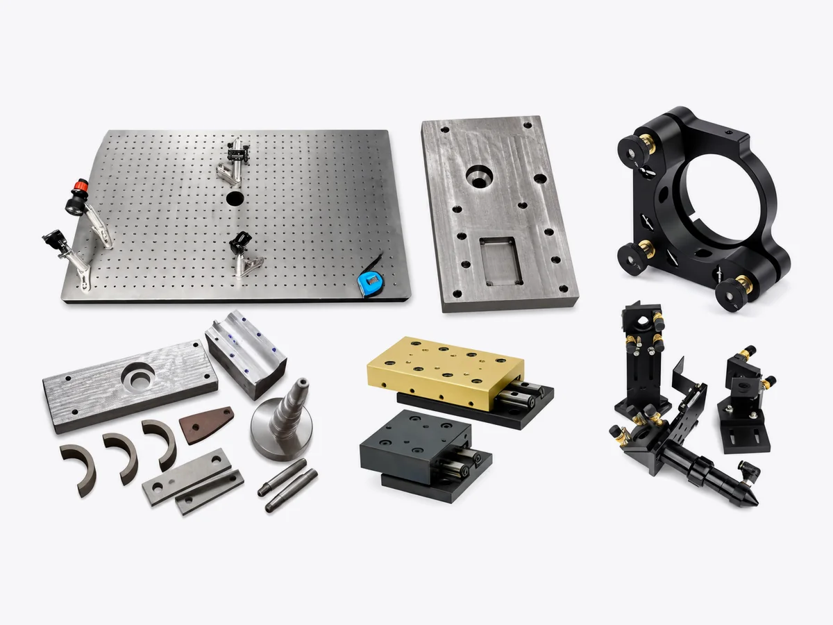 Optical breadboard, machined plates, linear stages and optical mounts